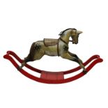 An early 20th century hand painted wooden rocking horse
