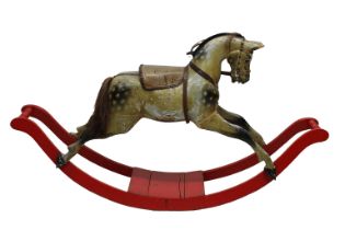 An early 20th century hand painted wooden rocking horse