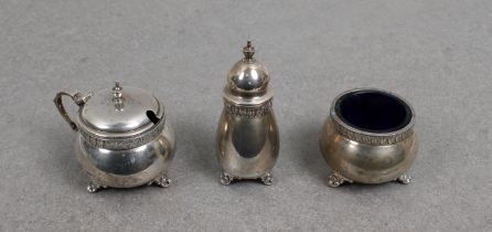 A silver three piece cruet set