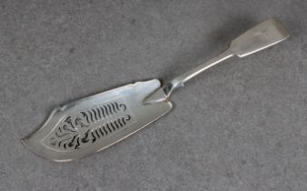 A Victorian silver Fiddle pattern fish slice with foliate scroll pierced blade