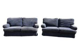 A pair of modern two seater sofas