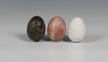 A collection of fifteen polished stone/marble eggs