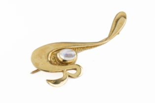 A limited edition 18ct gold moonstone set initial 'R' brooch by Catherine Best
