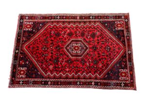 A Persian Qashqai wool rug