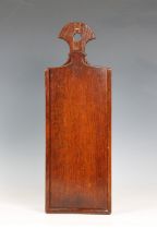 An English, late 18th century, stained oak hanging candle box