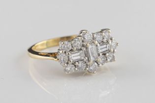 A yellow gold and diamond rectangular cluster ring