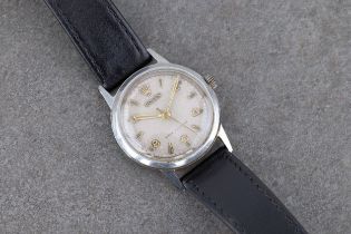 A Mid-Century Rolex Shock Resisting stainless steel mid size manual wind wrist watch