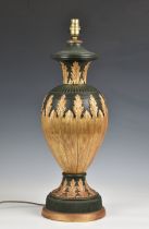 A ceramic gilt and dark green vase lamp