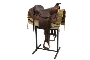 A Western tooled leather saddle