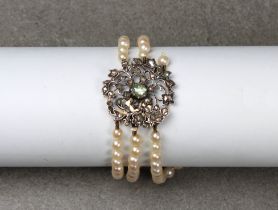 A late 19th century three-row cultured pearl bracelet