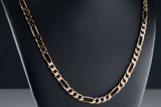 A 9ct rose gold Figaro link chain