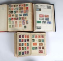 Three early 20th century stamp albums, stamps Queen Victoria to George VI