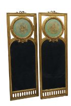 A pair of 19th century Continental gilt wood mirrors