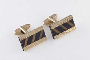 A pair of 1970s 9ct gold onyx and tiger's eye cufflinks