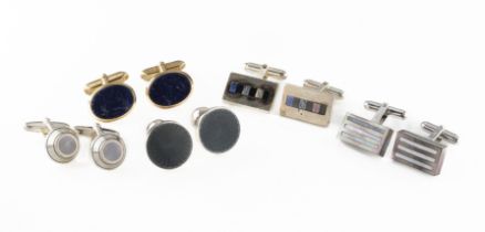 A collection of assorted cufflinks