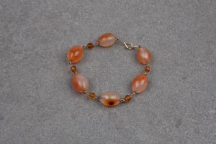 A vintage 9ct gold, amber and agate bead bracelet