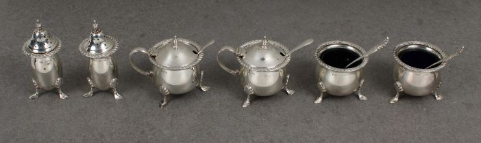 A six piece silver condiment set