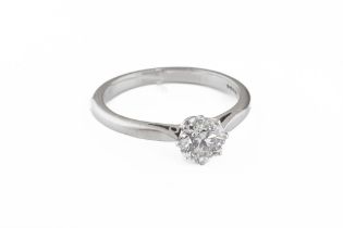 A platinum and diamond single-stone ring set with a brilliant-cut diamond, diamond approx. 0.81ct, r
