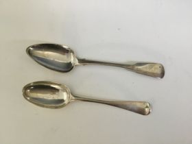 Two Channel Islands silver spoons