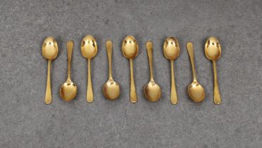 A set of nine silver gilt Hanoverian pattern teaspoons