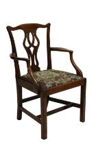An English mid 18th century mahogany elbow chair