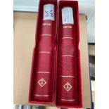 Two cased Lighthouse albums for Hong Kong, good condition a few stamps incl