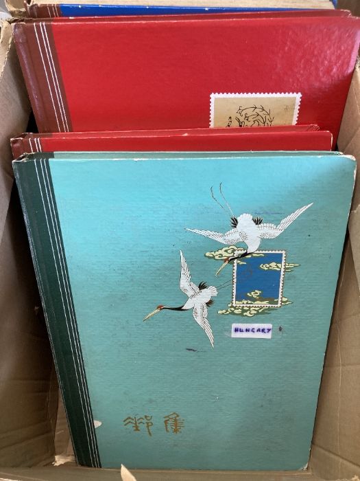 Four large stock books with over 2600 stamps World