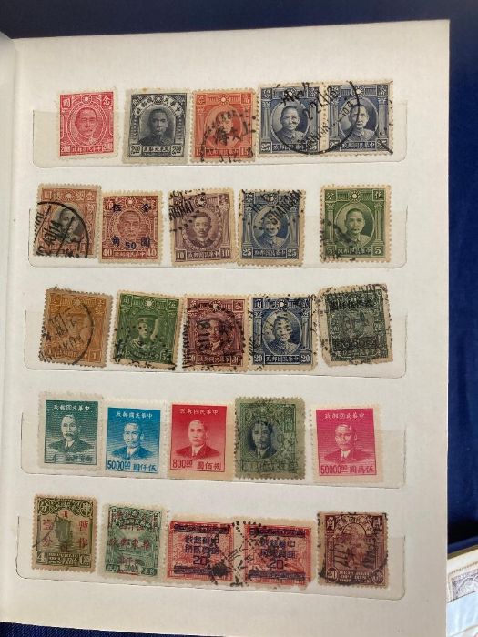 Three small stockbooks of old World stamps, including some China