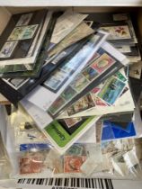 STAMPS : BRITISH COMMONWEALTH, a box with many 1000s mint & used loose off paper