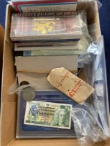 COINS : Box with various coin sets and commemorative coins, plus bank notes