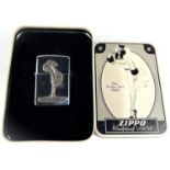 Two Zippo lighters:  The Varga Girl, in tin; 1996 Pinup Girls, collectable of the year, originally