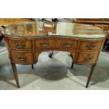 An inlaid mahogany kidney shaped desk with 2 drawers, on tapering legs, length 107cm, height 77cm