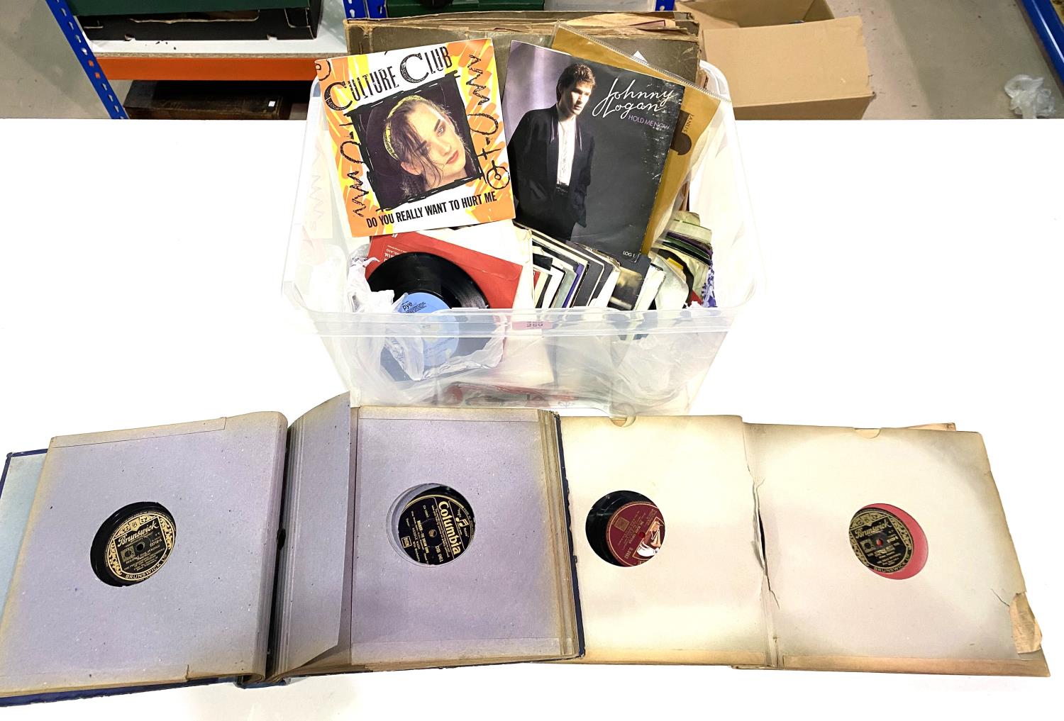 A large selection of 45 rpm records; 78 rpm albums; etc.
