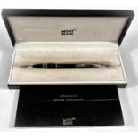 A boxed Mont Blanc ballpoint pen with guarantee booklet