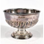 A hallmarked silver circular pedestal bowl with gadrooned lower section, on circular foot, Sheffield