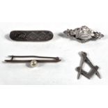 a hallmarked silver 'square & compass' pendant; a hallmarked silver brooch & two other silver/