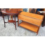 A mid 20th century teak two tier drinks trolley with drop leaves to each side and a mahogany oval