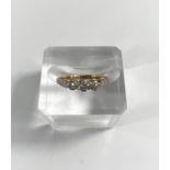 An Edwardian 18 carat gold ring set 3 diamonds, size M, 2.4gm