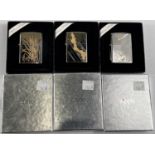 Three silver plated Zippo lighters with incised gilt decoration, boxed, Models 108WG, 109WG & 110WG