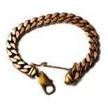 A gent's 9 carat hallmarked gold identity bracelet formed from flattened curb links, 48gm