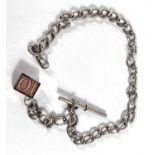 A hallmarked silver watch chain with bar & 10/- note fob, 28.8gm, overall length 30cm.