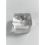 A modern 9 carat white gold ring with 9 small diamonds in square setting, size L, 2gm