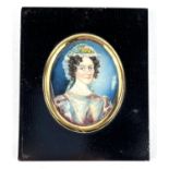 An early 19th century 1/2 length miniature portrait of a woman with a floral lace bonnet on ivory