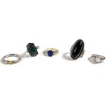 A silver ring set with peridot; a silver gilt ring set with oval blue synthetic sapphire & small