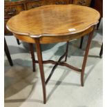 An Edwardian inlaid mahogany 2 tier occasional table with oval top, on square splay legs