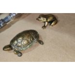 A Victorian brass stamp desk box in the form of a tortoise and a similar box in the form of a frog