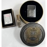 A Zippo Harley-Davidson lighter 'The Reunion 90 Years', in tin case; a brass Harley-Davidson lighter