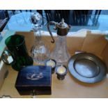 A silver plated topped claret jug, other glassware, tea caddy etc