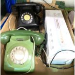 Two vintage rotary telephones, a wall clock etc