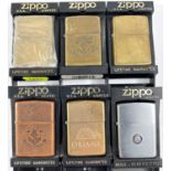 Six various Zippo lighters with metal cases:  copper Pusser's West Indies; brass Pusser's West